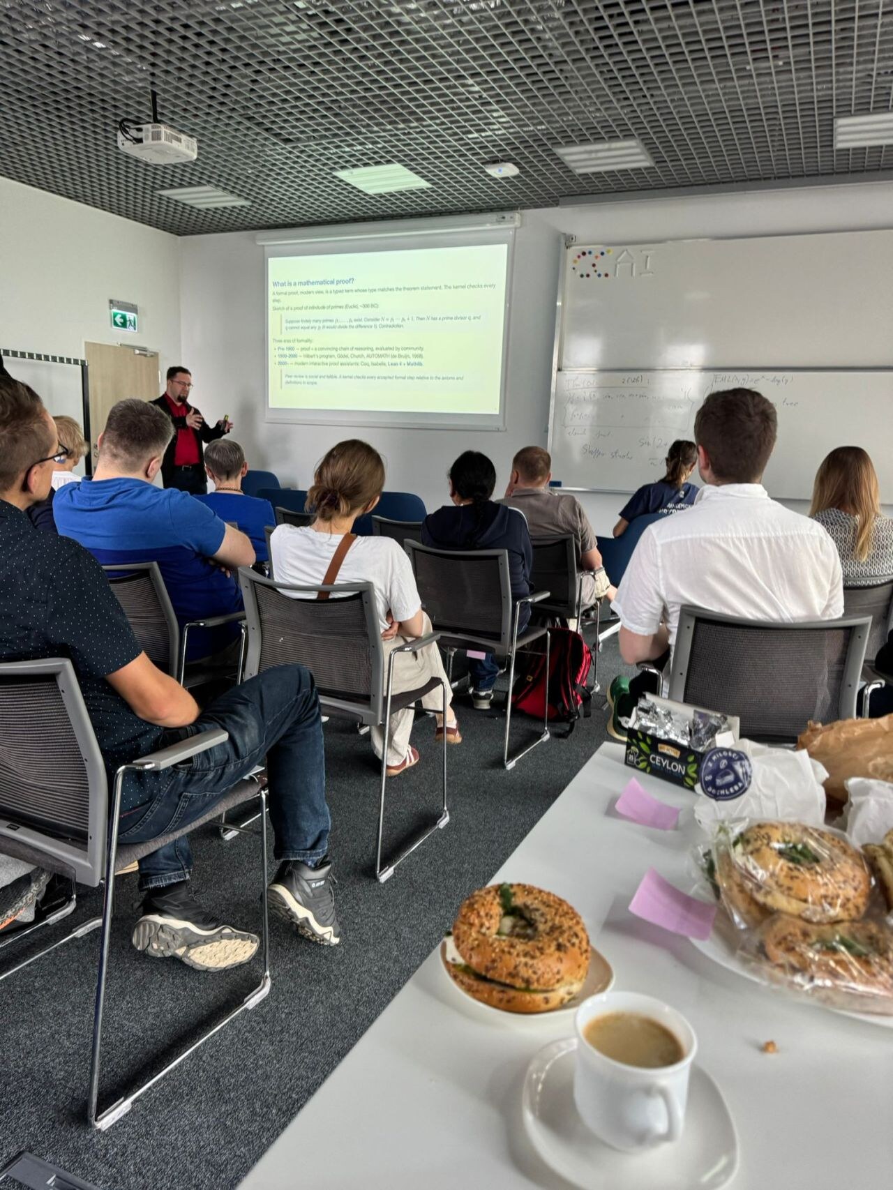 Bartosz Naskręcki speaking on what counts as a mathematical proof