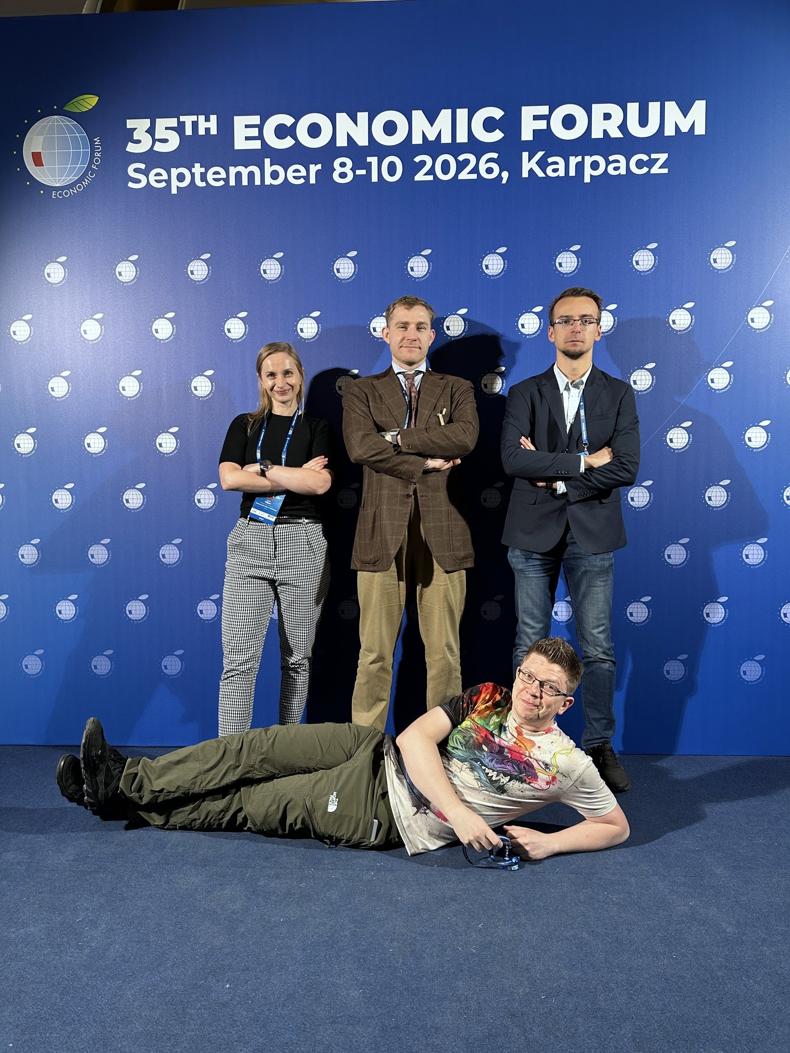 CCAI researchers at the 35th Economic Forum photo wall in Karpacz
