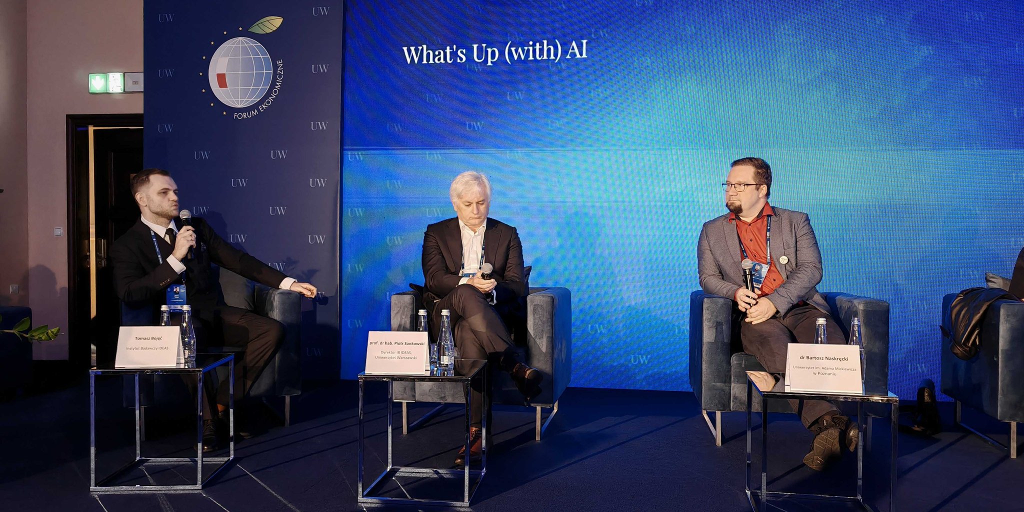 Tomasz Bojęć, Piotr Sankowski and Bartosz Naskręcki during the What's Up (with) AI panel