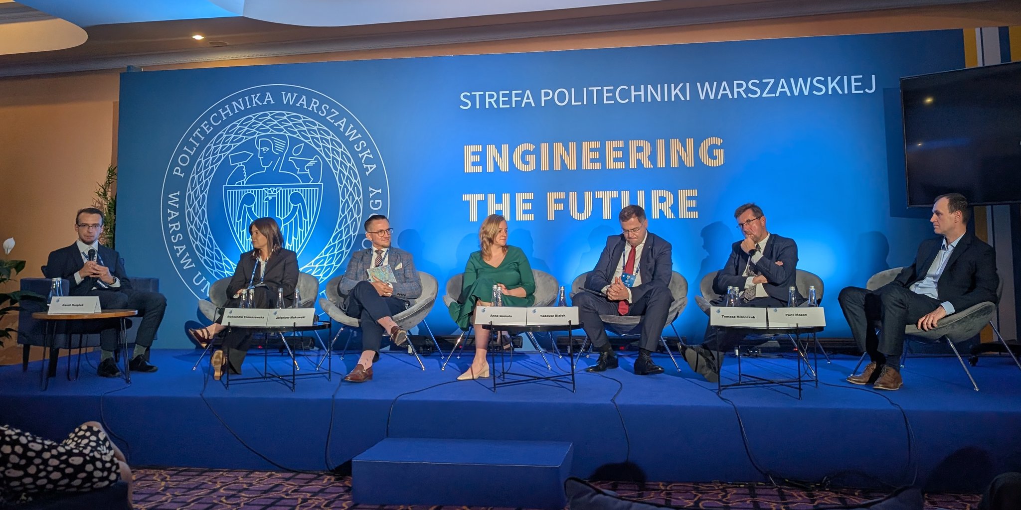 The panel on AI in finance, moderated by Kamil Książek