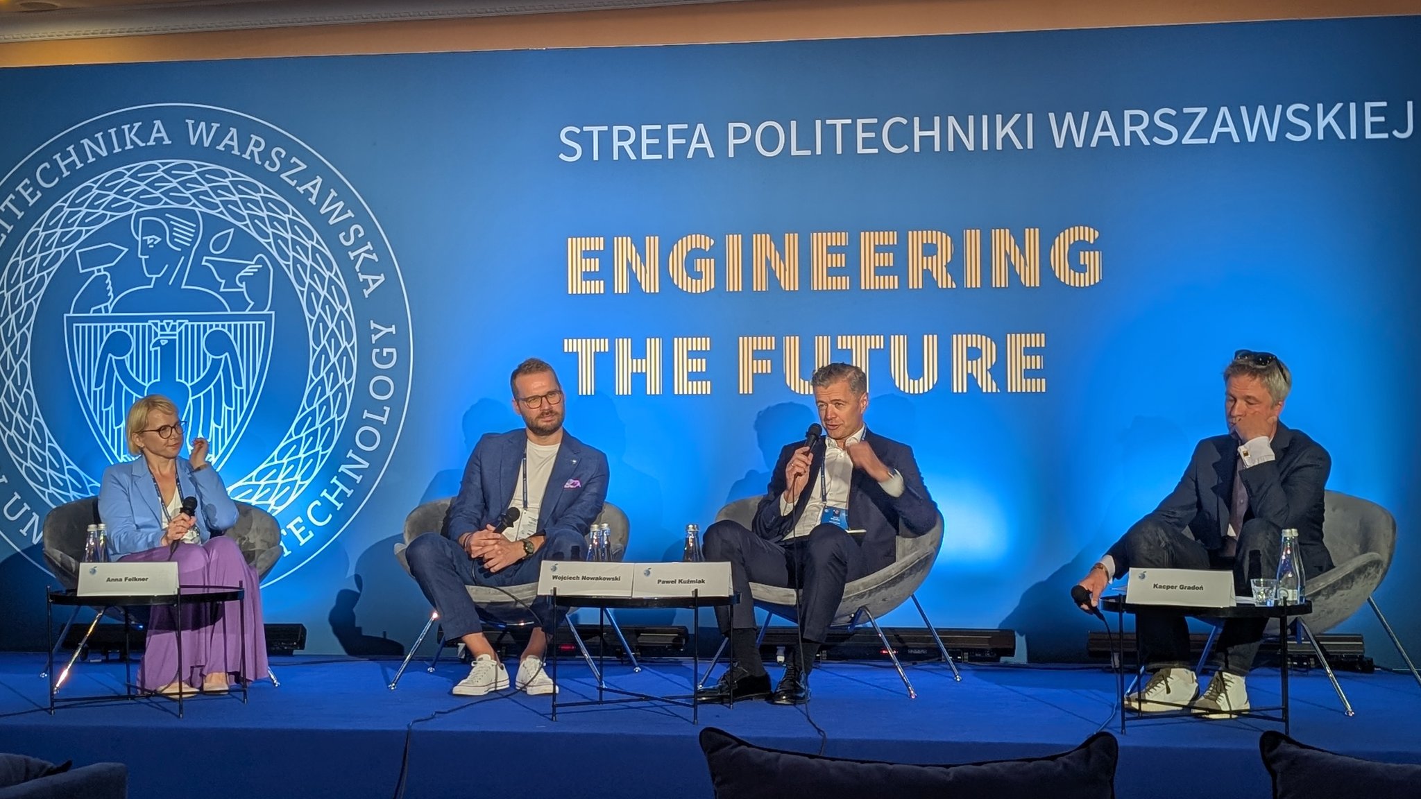 Anna Felkner, Wojciech Nowakowski, Paweł Kuźmiak and Kacper Gradoń on the panel on AI in defence and cybersecurity