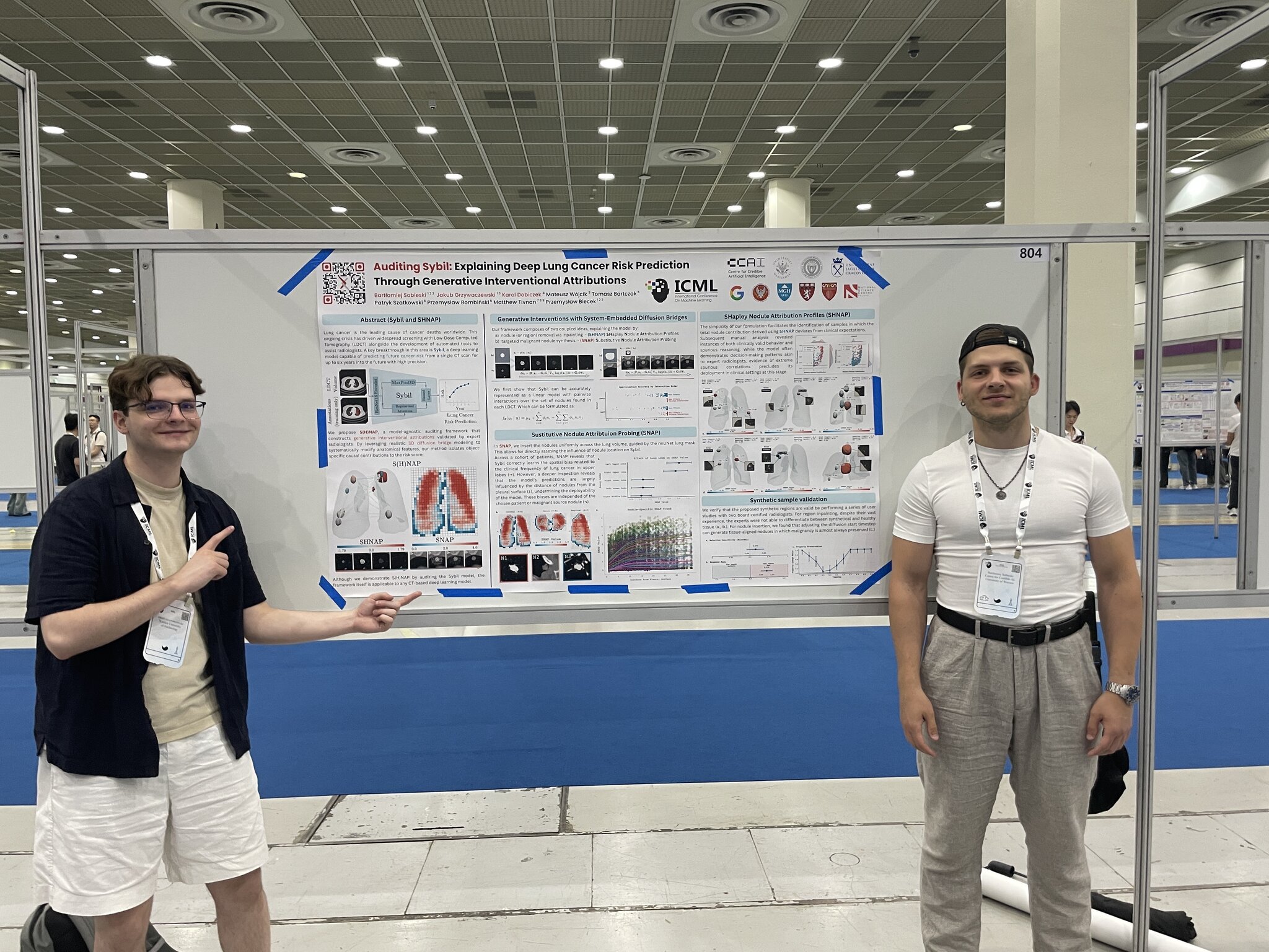 Jakub Grzywaczewski and Bartłomiej Sobieski at their ICML 2026 poster
